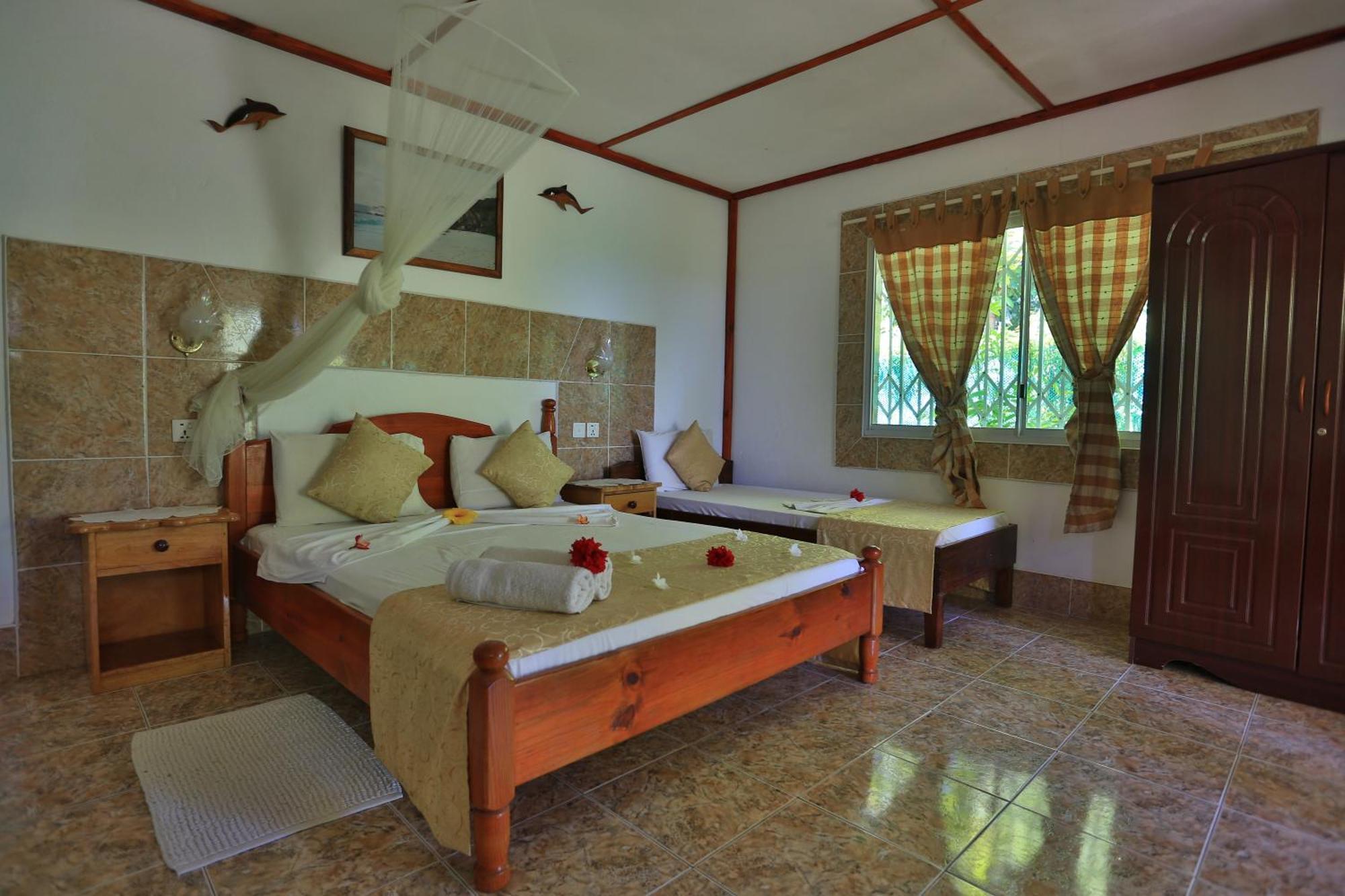 Rising Sun Guesthouse La Digue Pokoj fotografie